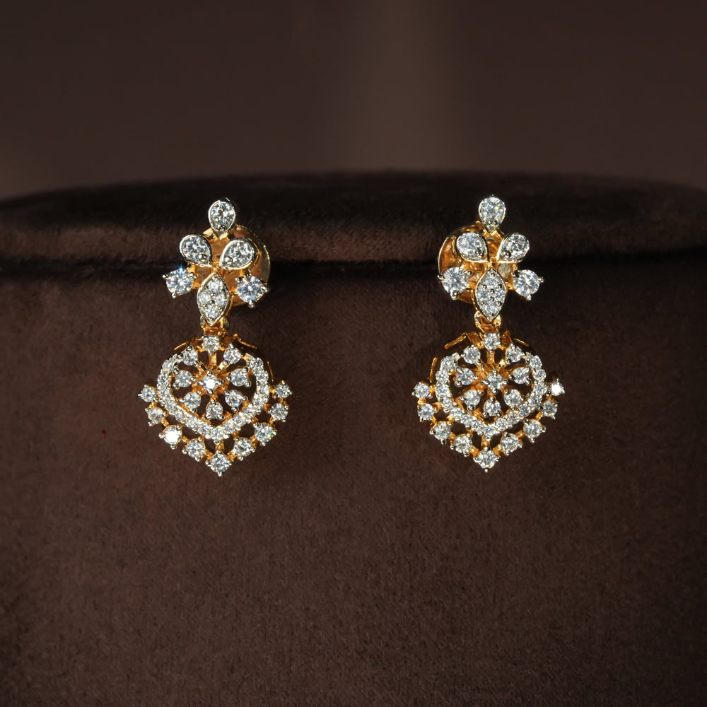 Luxury diamond-look silver earrings with premium cz stones in 92.5 silver, bridal wedding jewellery with gold finish by Sri Fine Jewellery Punjagutta Hyderabad.