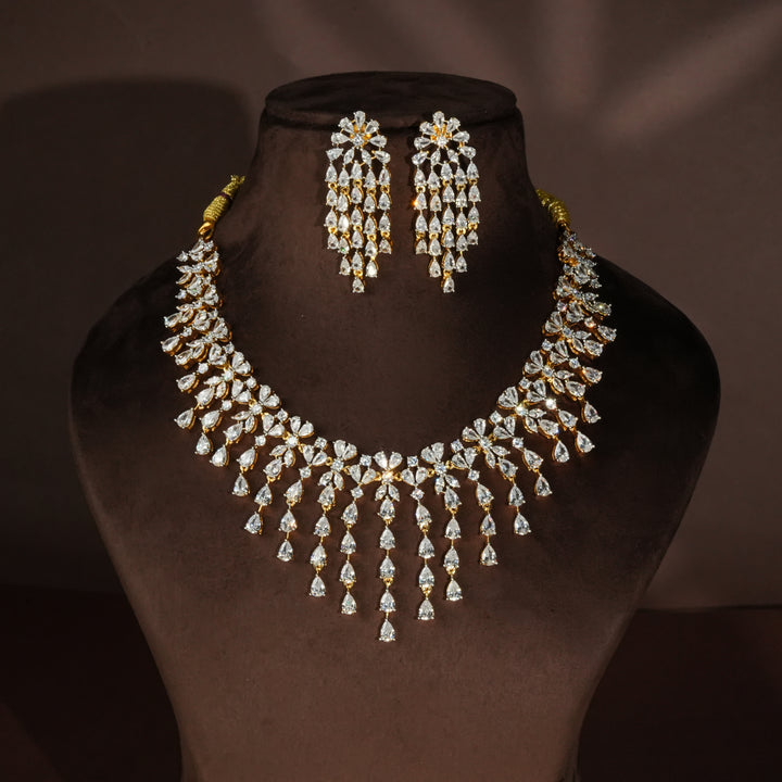 Luxury diamond-look silver necklace with premium cz stones in 92.5 silver, bridal wedding jewellery with gold finish by Sri Fine Jewellery Punjagutta Hyderabad.