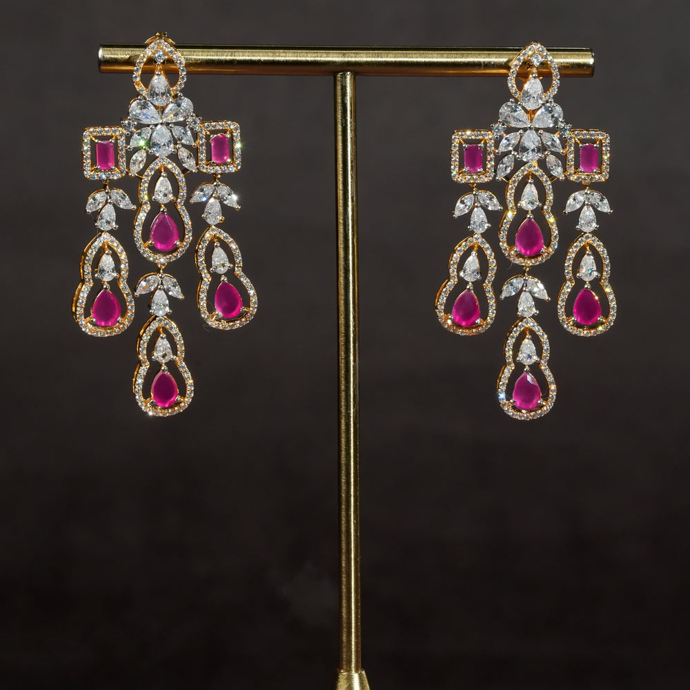 Handcrafted designer 92.5 silver cz earrings with premium cz stones and semi precious ruby embellishments. Perfect for bridal wear, festive occasions, weddings, and traditional ethnic styling.
Sri fine jewellery, Hyderabad. 