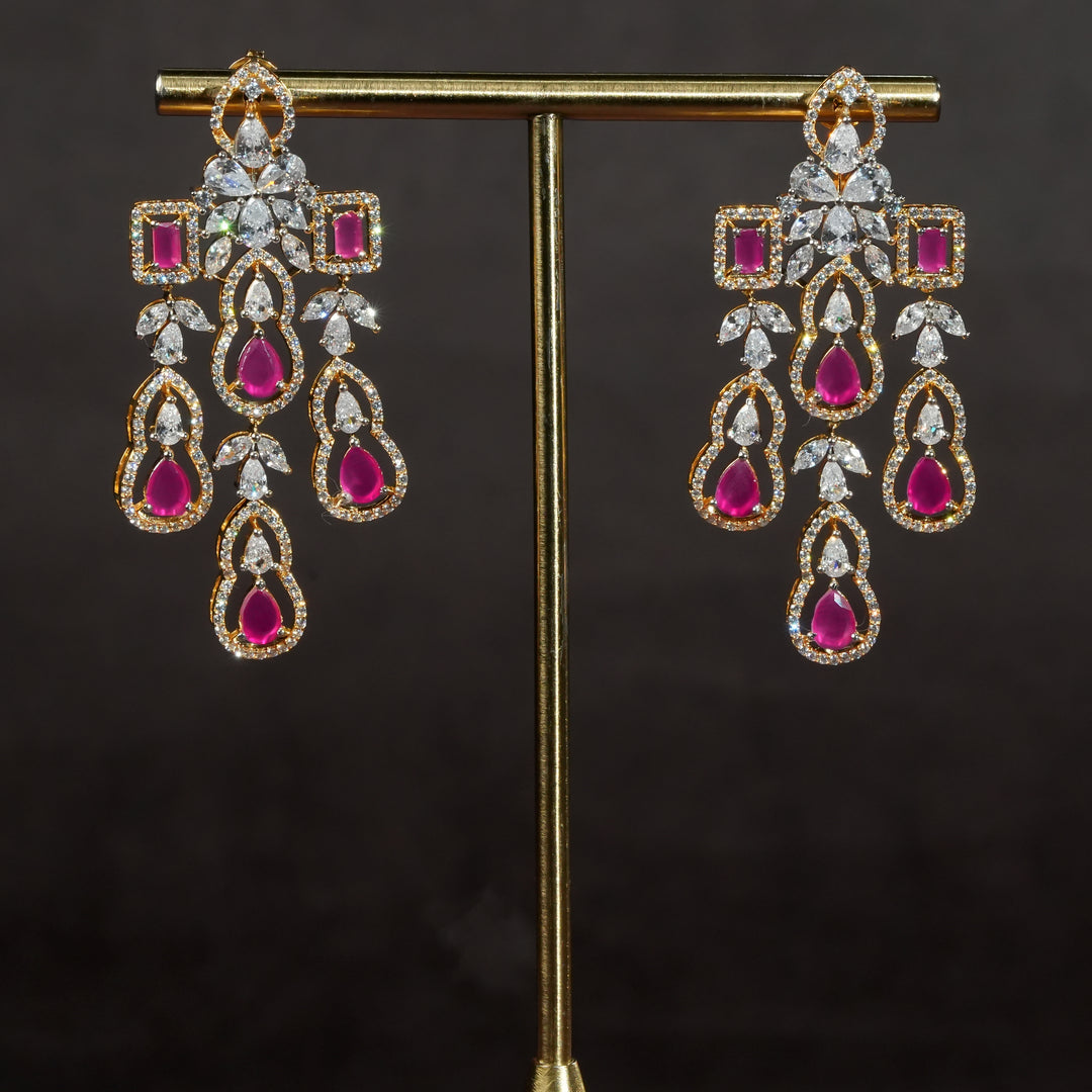 Handcrafted designer 92.5 silver cz earrings with premium cz stones and semi precious ruby embellishments. Perfect for bridal wear, festive occasions, weddings, and traditional ethnic styling.
Sri fine jewellery, Hyderabad. 