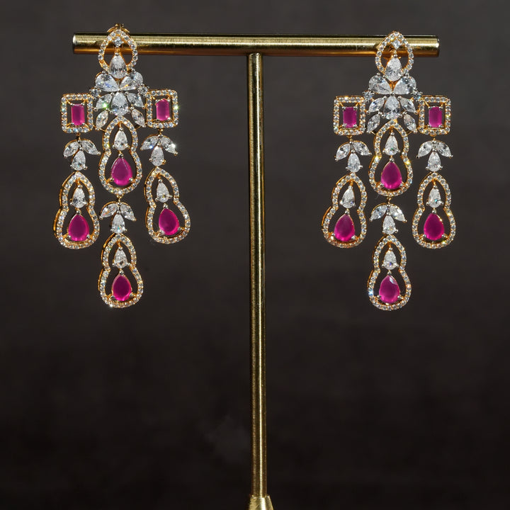 Handcrafted designer 92.5 silver cz earrings with premium cz stones and semi precious ruby embellishments. Perfect for bridal wear, festive occasions, weddings, and traditional ethnic styling.
Sri fine jewellery, Hyderabad. 