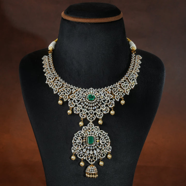 Handcrafted designer 92.5 silver cz emerald necklace with premium cz stones, semi precious emerald embellishments and floral motifs . Perfect for bridal wear, festive occasions, weddings, and traditional ethnic styling.
Sri fine jewellery, Hyderabad. 