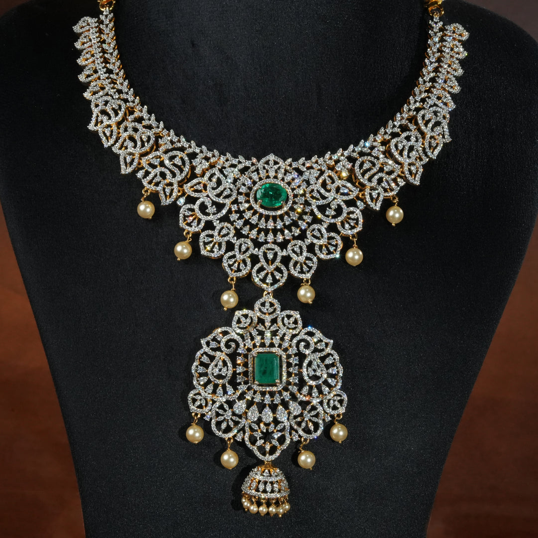 Handcrafted designer 92.5 silver cz emerald necklace with premium cz stones, semi precious emerald embellishments and floral motifs . Perfect for bridal wear, festive occasions, weddings, and traditional ethnic styling.
Sri fine jewellery, Hyderabad. 