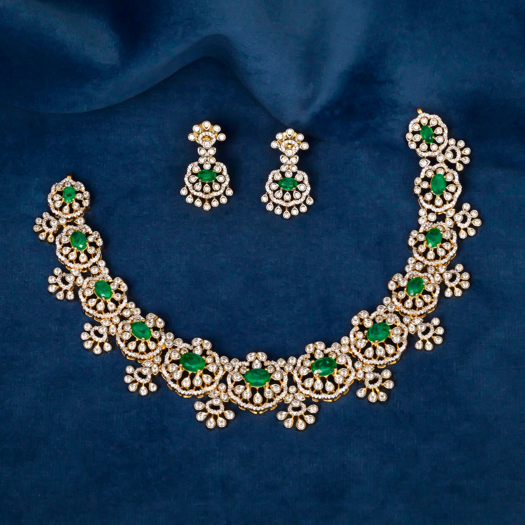 Handcrafted designer 92.5 silver cz emerald necklace set with premium cz stones, semi precious emerald embellishments and floral motifs . Perfect for bridal wear, festive occasions, weddings, and traditional ethnic styling.
Sri fine jewellery, Hyderabad. 