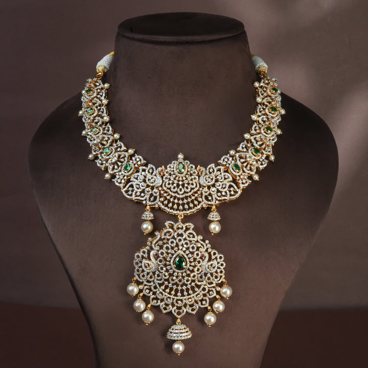 Handcrafted designer 92.5 silver cz emerald necklace with premium cz, semi precious emerald embellishments and peacock motifs . Perfect for bridal wear, festive occasions, weddings, and traditional ethnic styling.
Sri fine jewellery, Hyderabad. 