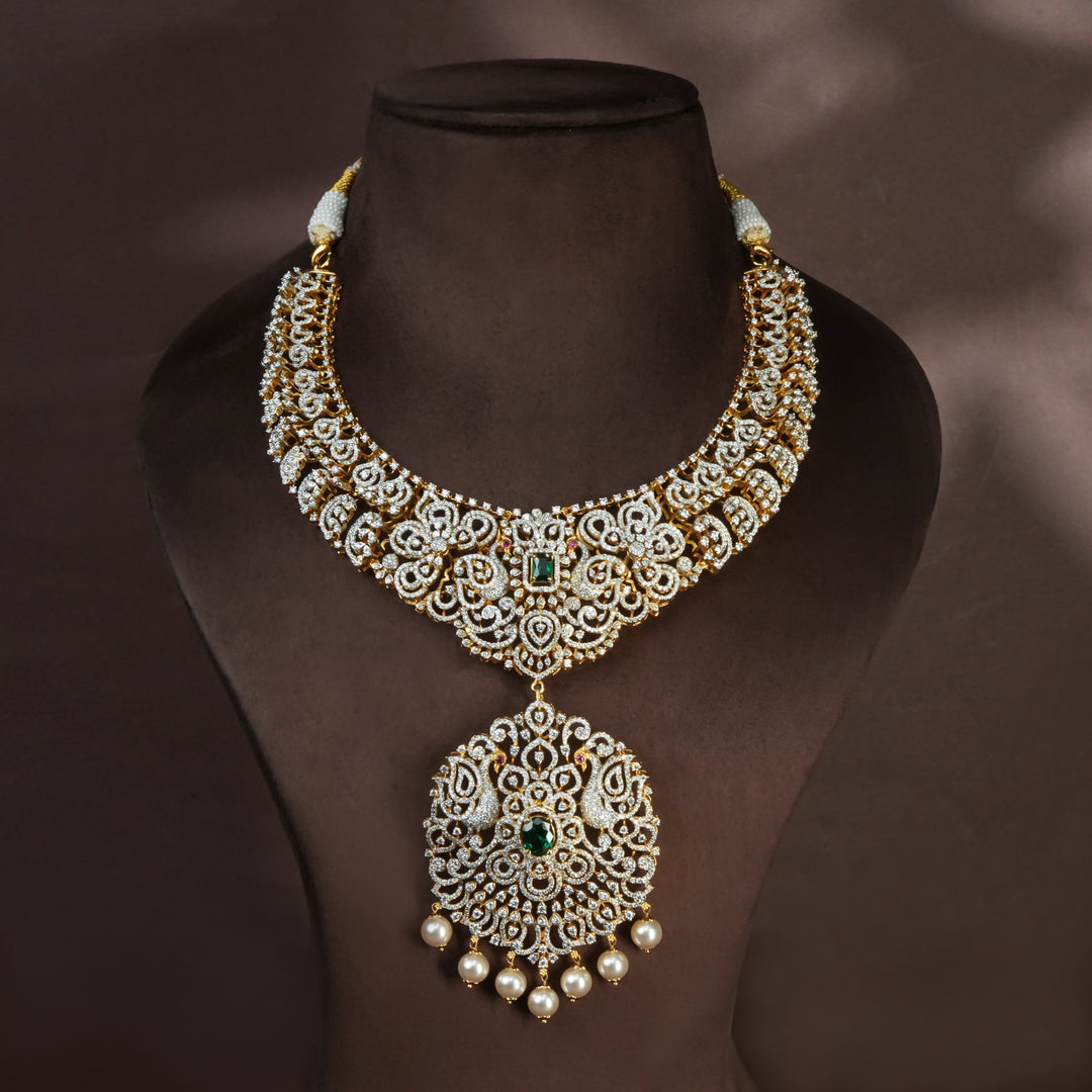 Handcrafted designer 92.5 silver cz emerald necklace with premium cz and semi precious emerald embellishments . Perfect for bridal wear, festive occasions, weddings, and traditional ethnic styling.
Sri fine jewellery, Hyderabad. 