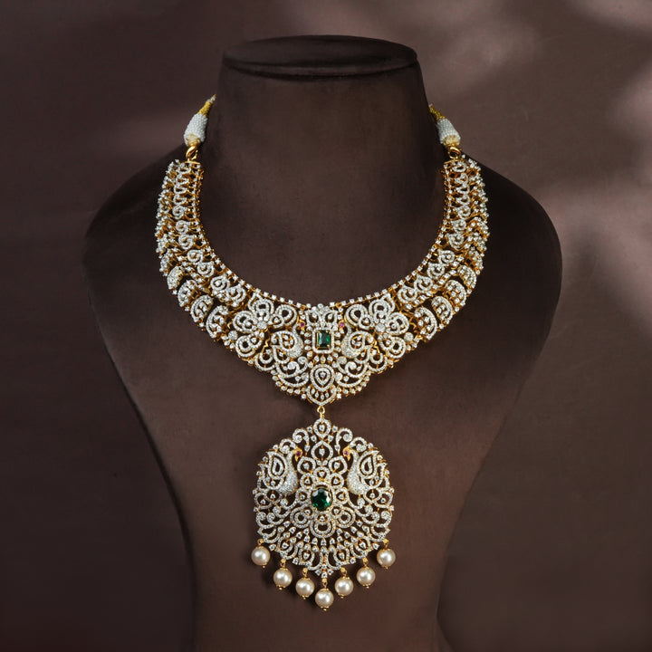 Handcrafted designer 92.5 silver cz emerald necklace with premium cz and semi precious emerald embellishments . Perfect for bridal wear, festive occasions, weddings, and traditional ethnic styling.
Sri fine jewellery, Hyderabad. 