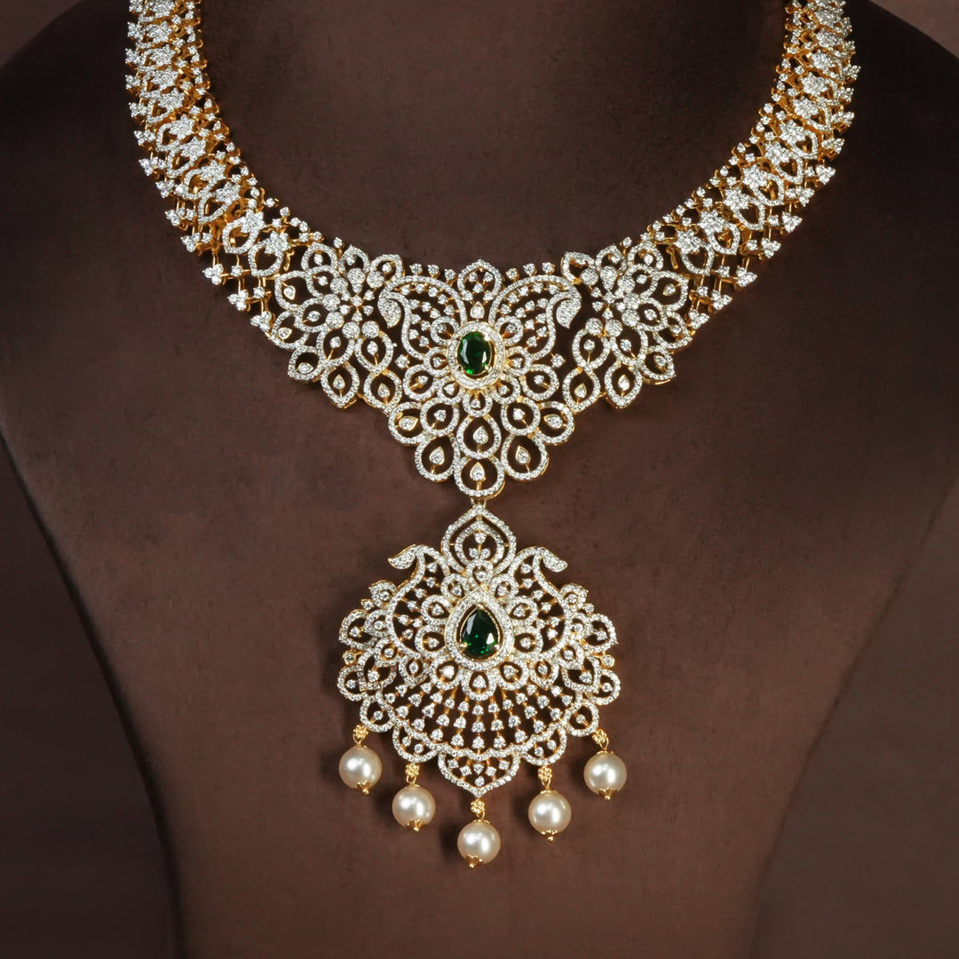 Handcrafted designer 92.5 silver cz emerald necklace with premium cz, semi precious emerald embellishments and mango motifs . Perfect for bridal wear, festive occasions, weddings, and traditional ethnic styling.
Sri fine jewellery, Hyderabad. 