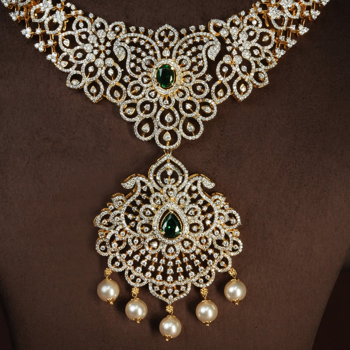 Close-up view of handcrafted designer 92.5 silver cz emerald necklace with premium cz, semi precious emerald embellishments and mango motifs . Perfect for bridal wear, festive occasions, weddings, and traditional ethnic styling.
Sri fine jewellery, Hyderabad. 