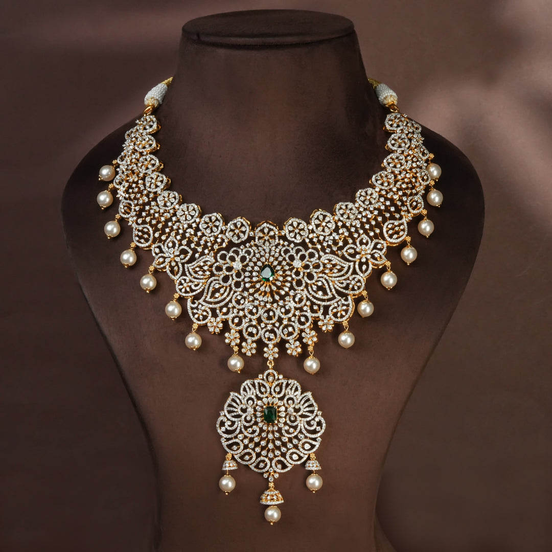 Handcrafted designer 92.5 silver cz emerald necklace with premium cz, and semi precious emerald embellishments. Perfect for bridal wear, festive occasions, weddings, and traditional ethnic styling.
Sri fine jewellery, Hyderabad. 