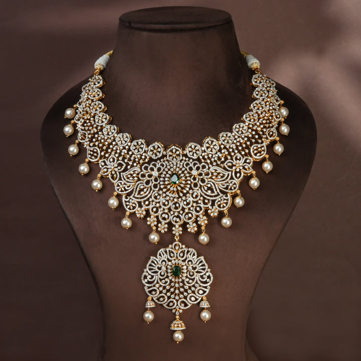 Handcrafted designer 92.5 silver cz emerald necklace with premium cz, and semi precious emerald embellishments. Perfect for bridal wear, festive occasions, weddings, and traditional ethnic styling.
Sri fine jewellery, Hyderabad. 