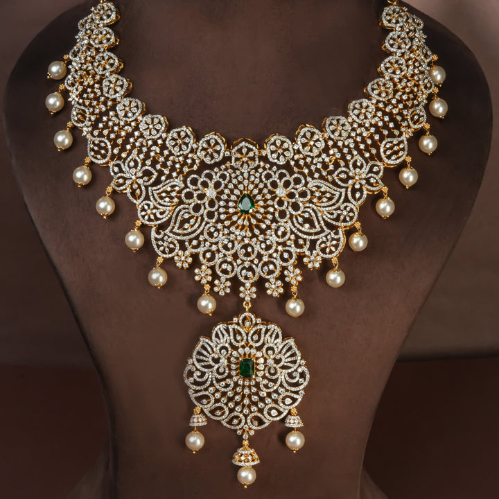 Handcrafted designer 92.5 silver cz emerald necklace with premium cz, semi precious emerald embellishments and peacock motifs. Perfect for bridal wear, festive occasions, weddings, and traditional ethnic styling.
Sri fine jewellery, Hyderabad. 