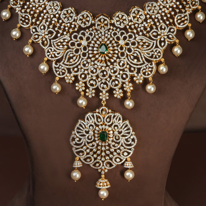 Close-up view of handcrafted designer 92.5 silver cz emerald necklace with premium cz, semi precious emerald embellishments and peacock motifs. Perfect for bridal wear, festive occasions, weddings, and traditional ethnic styling.
Sri fine jewellery, Hyderabad. 