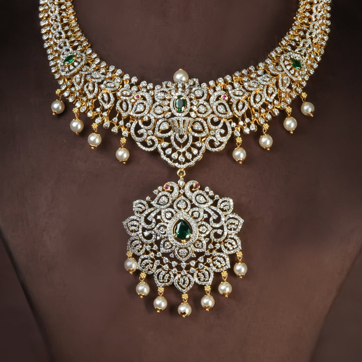 Handcrafted designer 92.5 silver cz emerald necklace with premium cz, semi precious emerald embellishments and peacock motifs. Perfect for bridal wear, festive occasions, weddings, and traditional ethnic styling.
Sri fine jewellery, Hyderabad. 