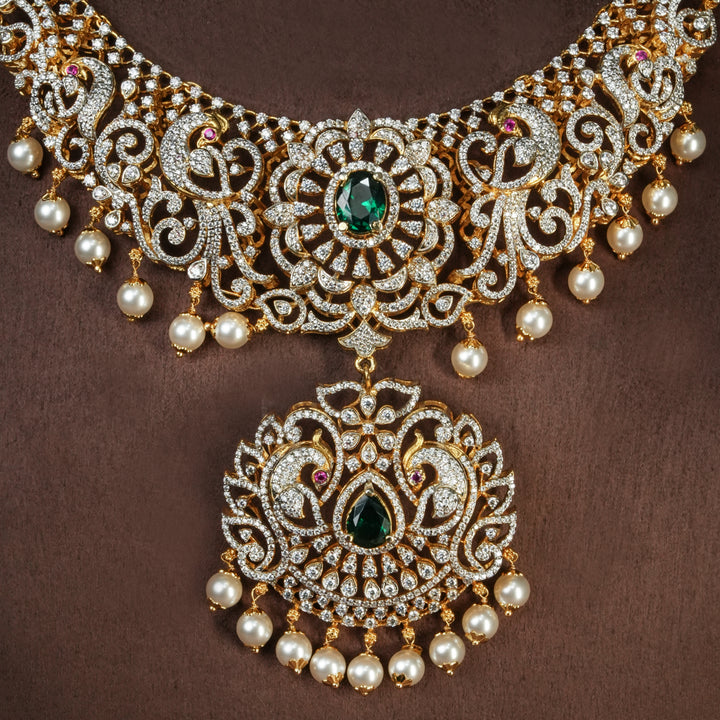 Close-up view of handcrafted designer 92.5 silver cz emerald necklace with premium cz, semi precious emerald embellishments and peacock motifs. Perfect for bridal wear, festive occasions, weddings, and traditional ethnic styling.
Sri fine jewellery, Hyderabad. 