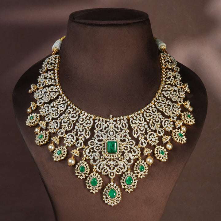 Handcrafted designer 92.5 silver cz emerald necklace with premium cz and semi precious emerald embellishments . Perfect for bridal wear, festive occasions, weddings, and traditional ethnic styling.
Sri fine jewellery, Hyderabad. 