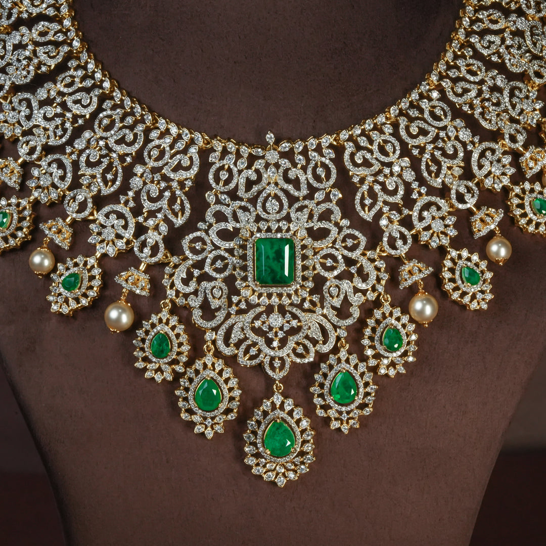 Close-up view of handcrafted designer 92.5 silver cz emerald necklace with premium cz and semi precious emerald embellishments . Perfect for bridal wear, festive occasions, weddings, and traditional ethnic styling.
Sri fine jewellery, Hyderabad. 