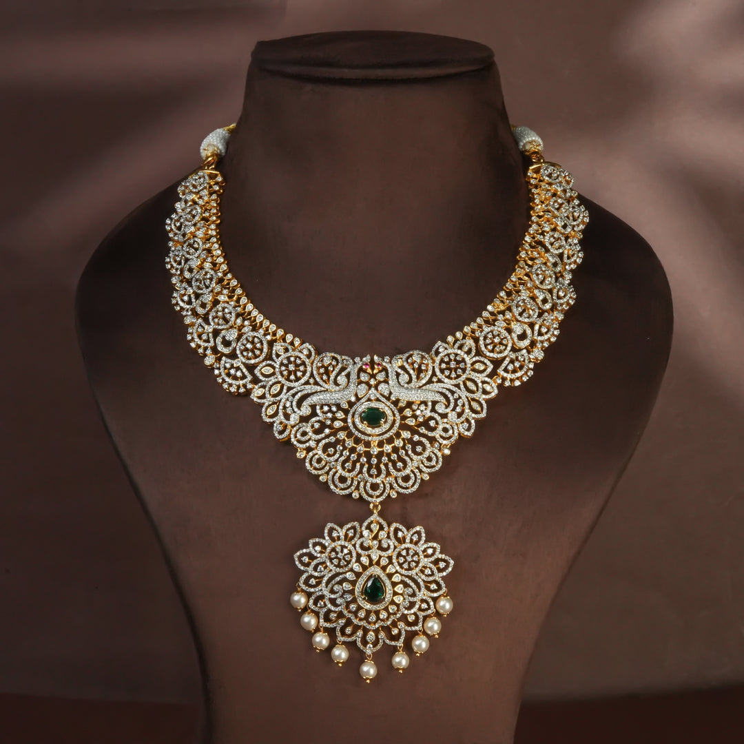 Handcrafted designer 92.5 silver cz emerald necklace with premium cz and semi precious emerald embellishments, peacock motifs. Perfect for bridal wear, festive occasions, weddings, and traditional ethnic styling.
Sri fine jewellery, Hyderabad. 