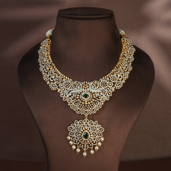 Handcrafted designer 92.5 silver cz emerald necklace with premium cz and semi precious emerald embellishments, peacock motifs. Perfect for bridal wear, festive occasions, weddings, and traditional ethnic styling.
Sri fine jewellery, Hyderabad. 