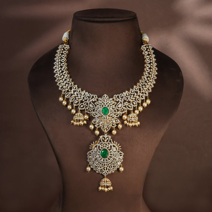 Handcrafted designer 92.5 silver cz emerald necklace with premium cz and semi precious emerald embellishments . Perfect for bridal wear, festive occasions, weddings, and traditional ethnic styling.
Sri fine jewellery, Hyderabad. 