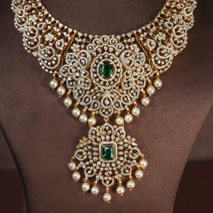 Close-up of handcrafted designer 92.5 silver cz emerald necklace with premium cz and semi precious emerald embellishments . Perfect for bridal wear, festive occasions, weddings, and traditional ethnic styling.
Sri fine jewellery, Hyderabad. 