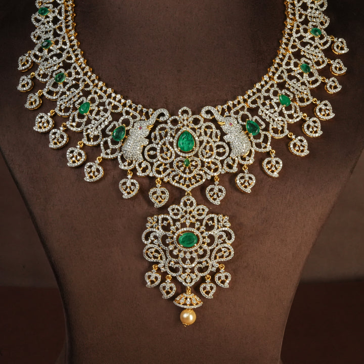 Handcrafted designer 92.5 silver cz emerald necklace with premium cz embellishments, elephant motifs. Perfect for bridal wear, festive occasions, weddings, and traditional ethnic styling.
Sri fine jewellery, Hyderabad. 