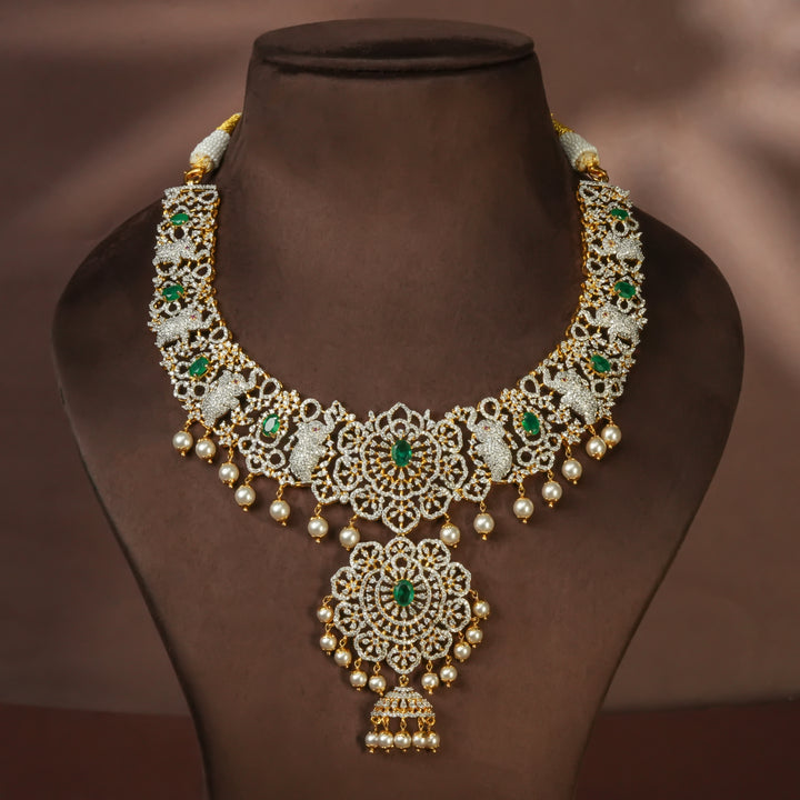 Handcrafted designer 92.5 silver cz emerald necklace with premium cz embellishments, elephant motifs. Perfect for bridal wear, festive occasions, weddings, and traditional ethnic styling.
Sri fine jewellery, Hyderabad. 