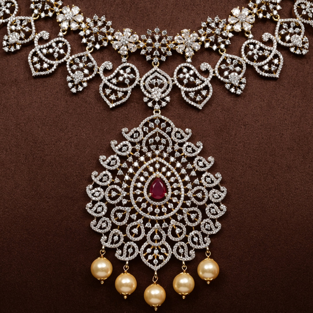 Close-up of Hriday collection of  92.5 silver short necklace with CZ stones, intricate floral motifs, and pendant design for bridal and festive wear by Sri Fine Jewellery, Hyderabad