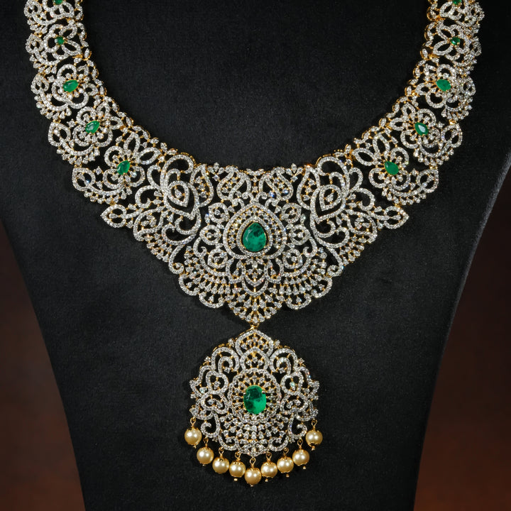 Close-up of luxury bridal necklace set in 92.5 silver with semi-precious emerald stones, antique finish and intricate design, handcrafted wedding jewellery for brides by Sri Fine Jewellery, Hyderabd(https://srifinejewellery.com)