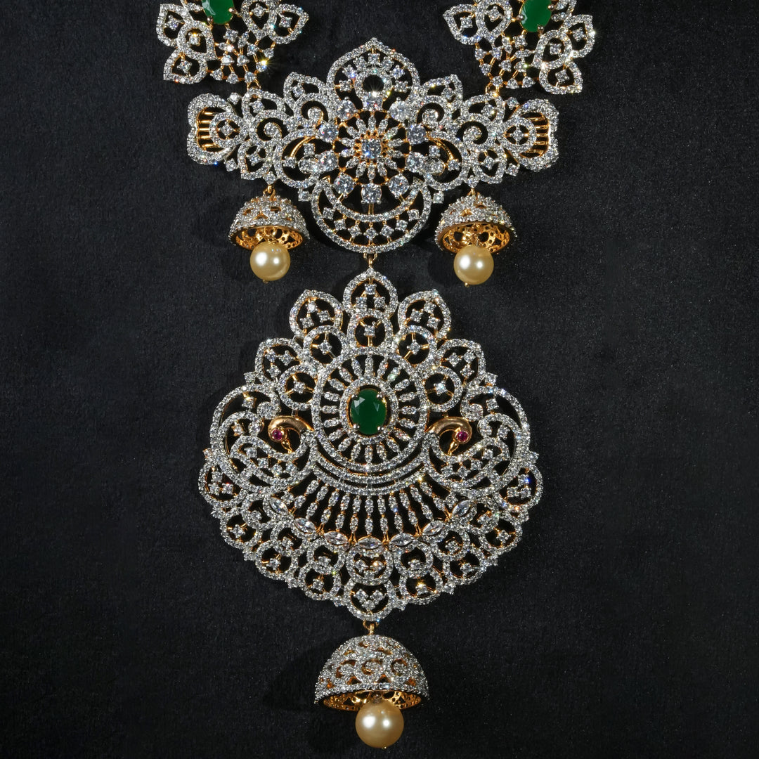 Close-up view of luxury bridal necklace set in 92.5 silver with semi-precious emerald stones, antique finish and intricate design, handcrafted wedding jewellery for brides by Sri Fine Jewellery, Hyderabd(https://srifinejewellery.com)