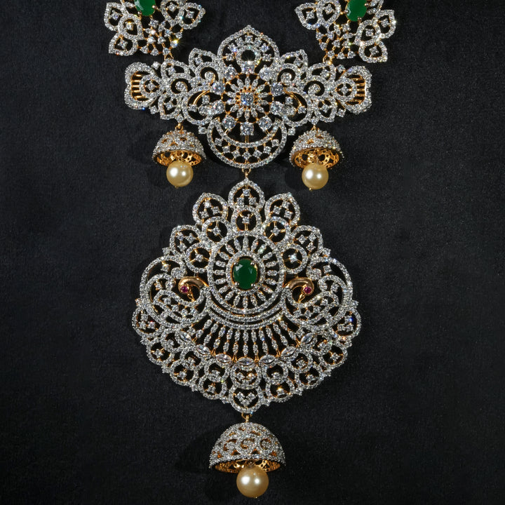 Close-up view of luxury bridal necklace set in 92.5 silver with semi-precious emerald stones, antique finish and intricate design, handcrafted wedding jewellery for brides by Sri Fine Jewellery, Hyderabd(https://srifinejewellery.com)