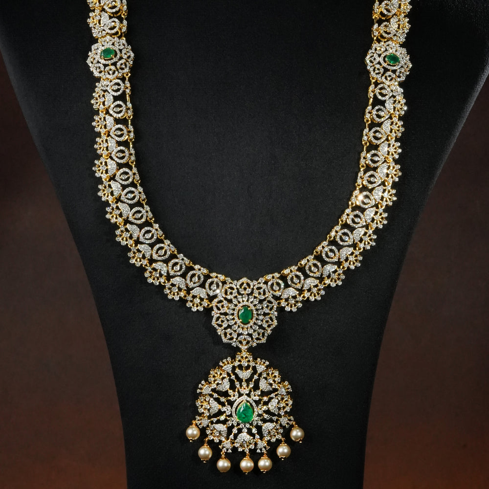 Close-up view of luxury bridal necklace set in 92.5 silver with semi-precious emerald stones, antique finish and intricate design, handcrafted wedding jewellery for brides by Sri Fine Jewellery, Hyderabd(https://srifinejewellery.com)
