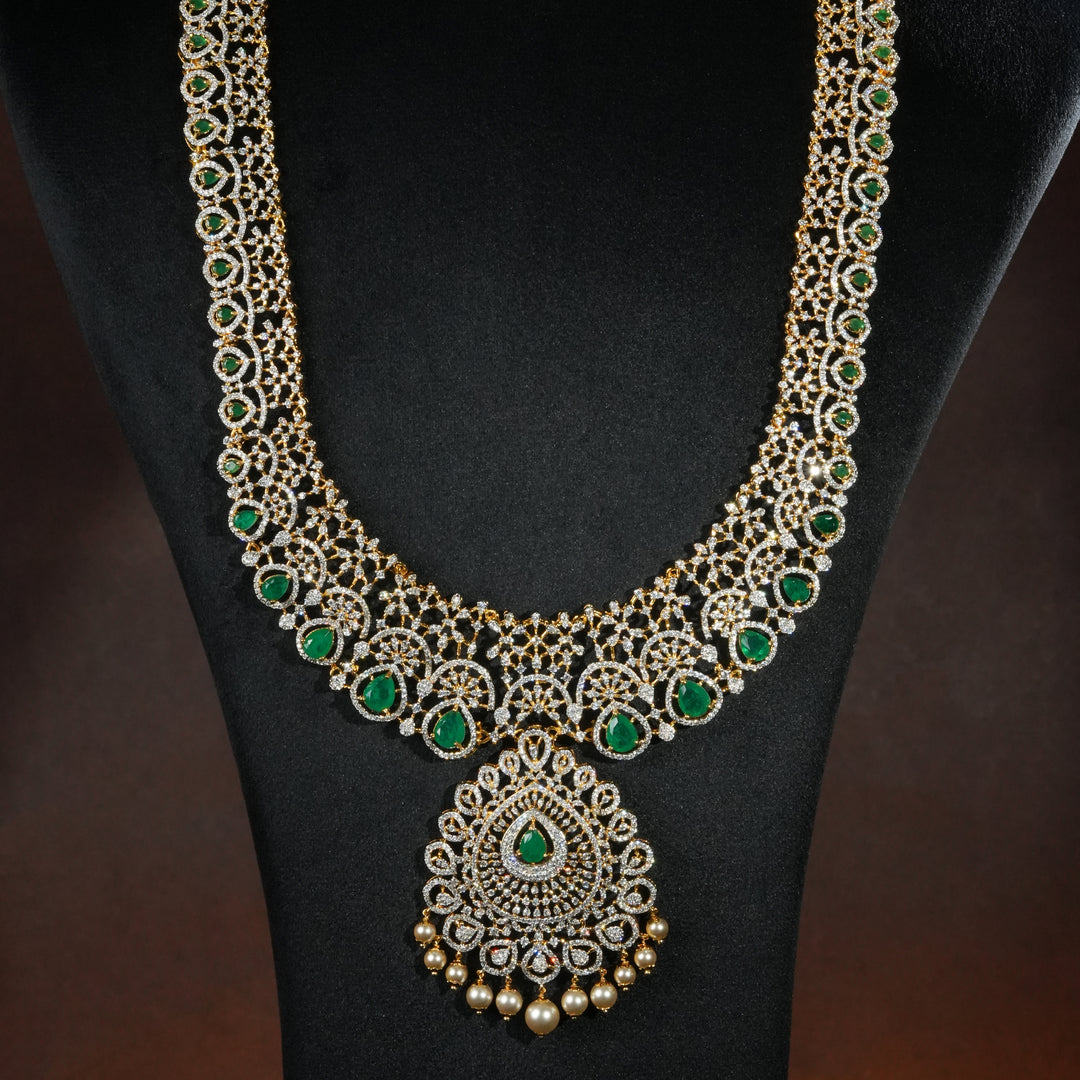 Luxury bridal necklace set in 92.5 silver with semi-precious emerald stones, antique finish and intricate design, handcrafted wedding jewellery for brides by Sri Fine Jewellery, Hyderabd(https://srifinejewellery.com)