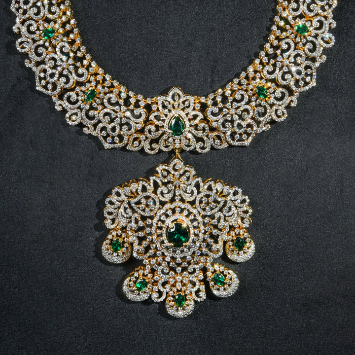 Close-up view of luxury bridal necklace set in 92.5 silver with semi-precious emerald stones, antique finish and intricate design, handcrafted wedding jewellery for brides by Sri Fine Jewellery, Hyderabd(https://srifinejewellery.com)