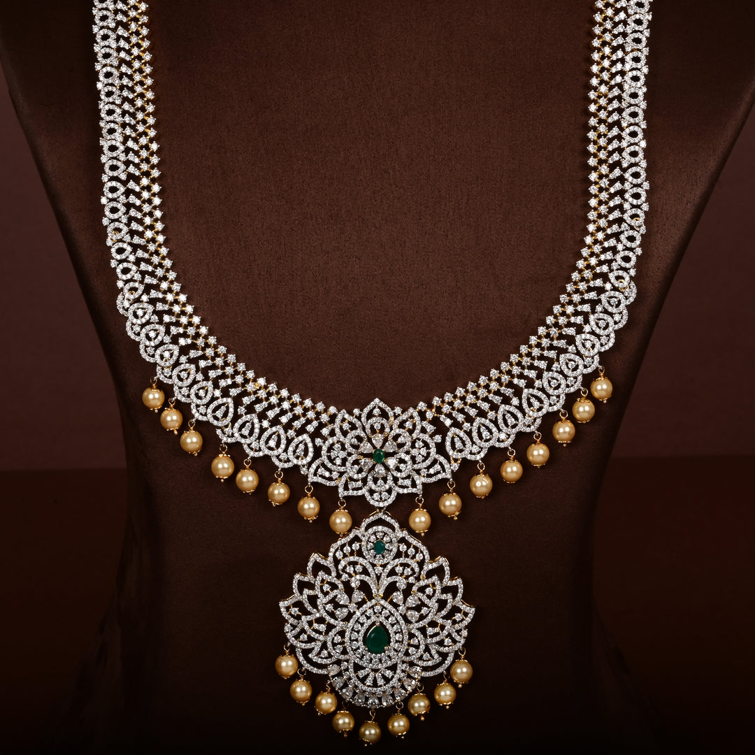 Close-up of luxury bridal necklace set in 92.5 silver with semi-precious emerald stones, antique finish and intricate design, handcrafted wedding jewellery for brides by Sri Fine Jewellery, Hyderabd(https://srifinejewellery.com)