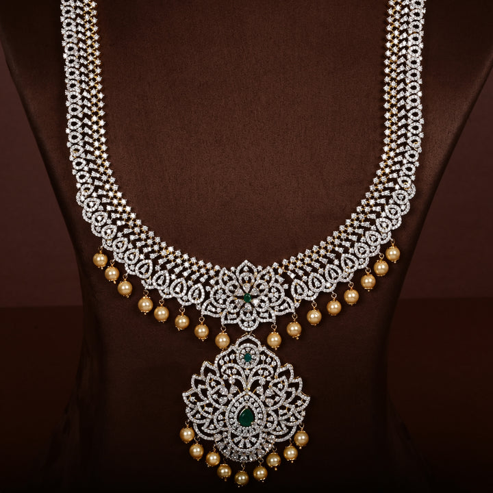 Close-up of luxury bridal necklace set in 92.5 silver with semi-precious emerald stones, antique finish and intricate design, handcrafted wedding jewellery for brides by Sri Fine Jewellery, Hyderabd(https://srifinejewellery.com)