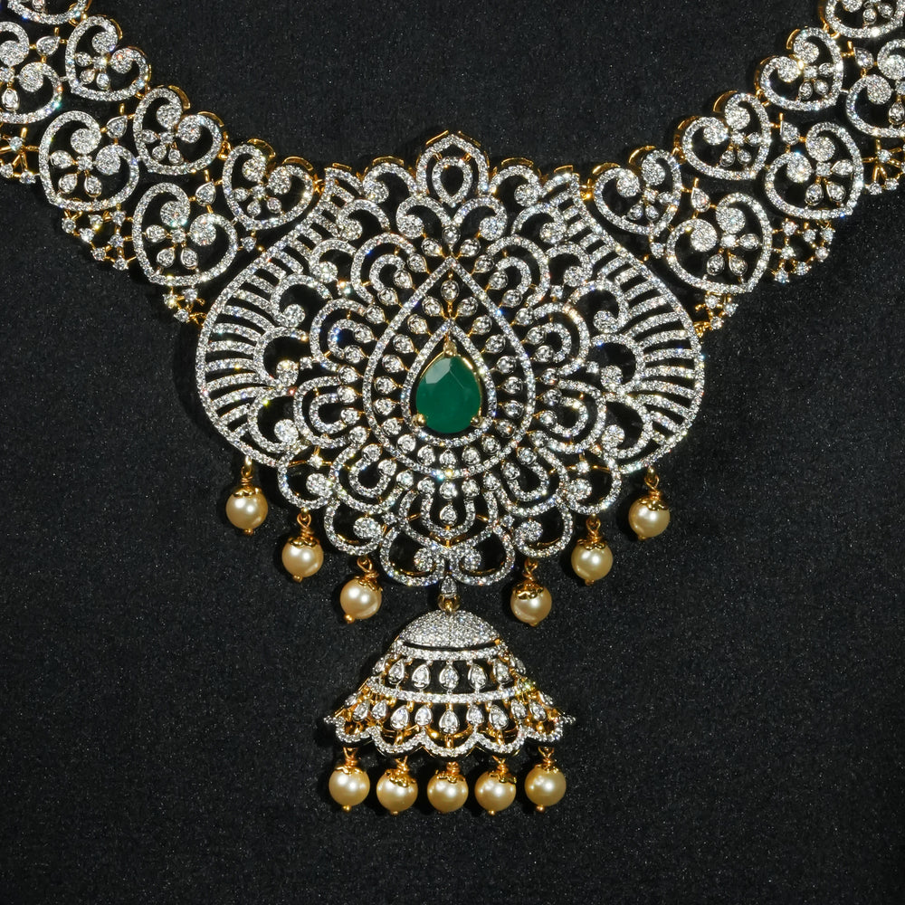Close-up view luxury bridal necklace set in 92.5 silver with emerald green stones, antique finish and intricate design, handcrafted wedding jewellery for brides by Sri Fine Jewellery, Hyderabd(https://srifinejewellery.com)