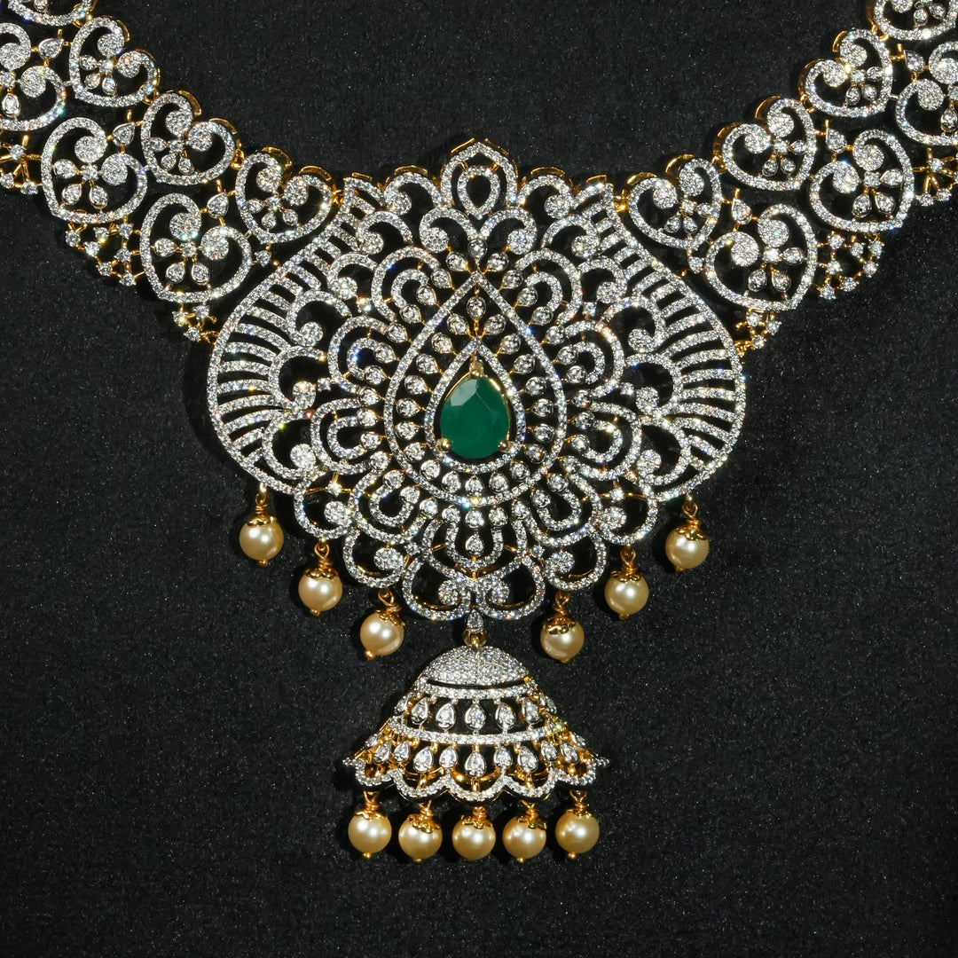 Close-up view luxury bridal necklace set in 92.5 silver with emerald green stones, antique finish and intricate design, handcrafted wedding jewellery for brides by Sri Fine Jewellery, Hyderabd(https://srifinejewellery.com)