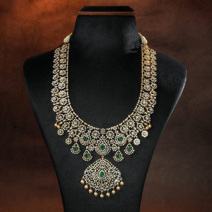 Luxury bridal necklace set in 92.5 silver with emerald green stones, antique finish and intricate design, handcrafted wedding jewellery for brides by Sri Fine Jewellery, Hyderabd(https://srifinejewellery.com)