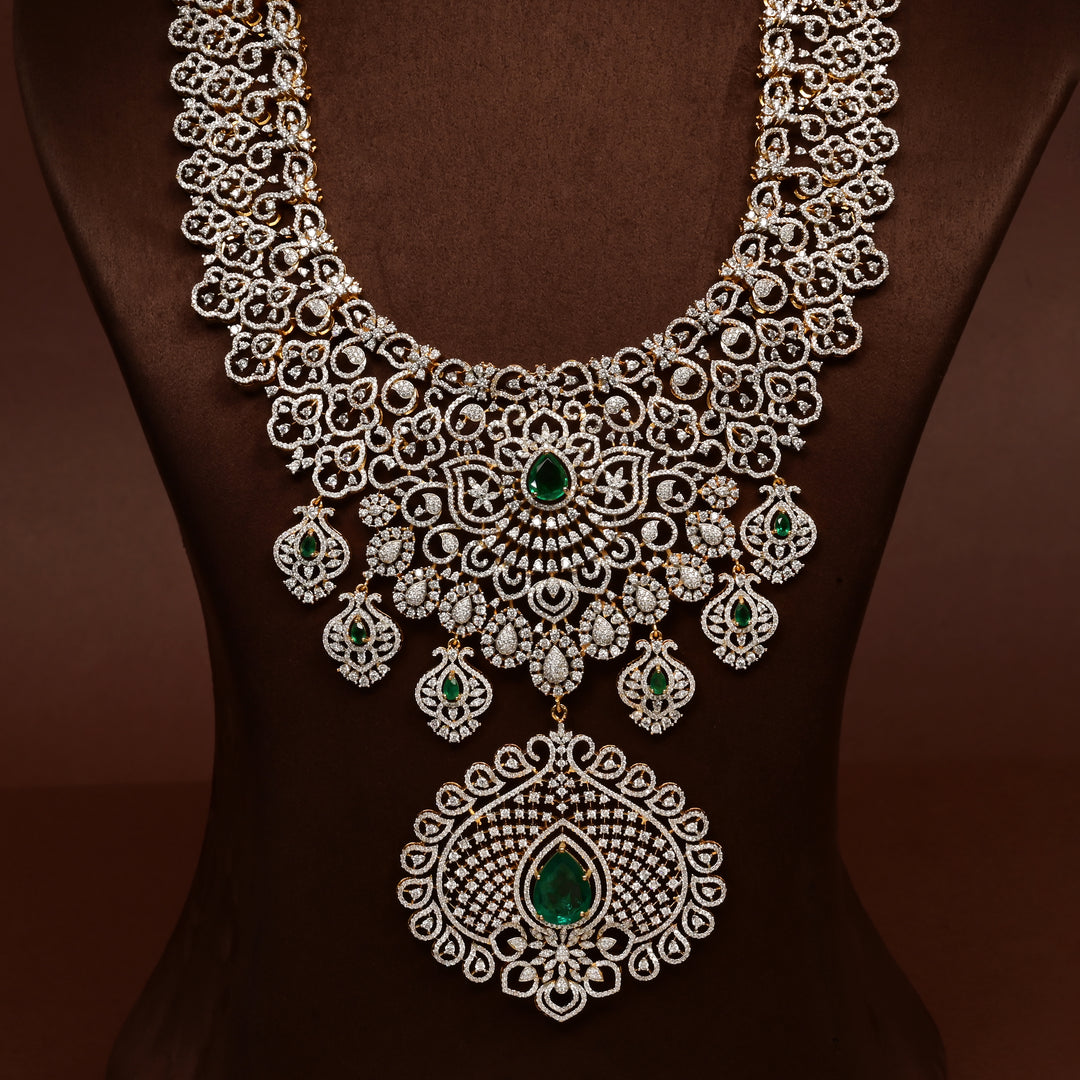 Luxury bridal necklace set in 92.5 silver with emerald green stones, antique finish and intricate design, handcrafted wedding jewellery for brides by Sri Fine Jewellery, Hyderabd(https://srifinejewellery.com)
