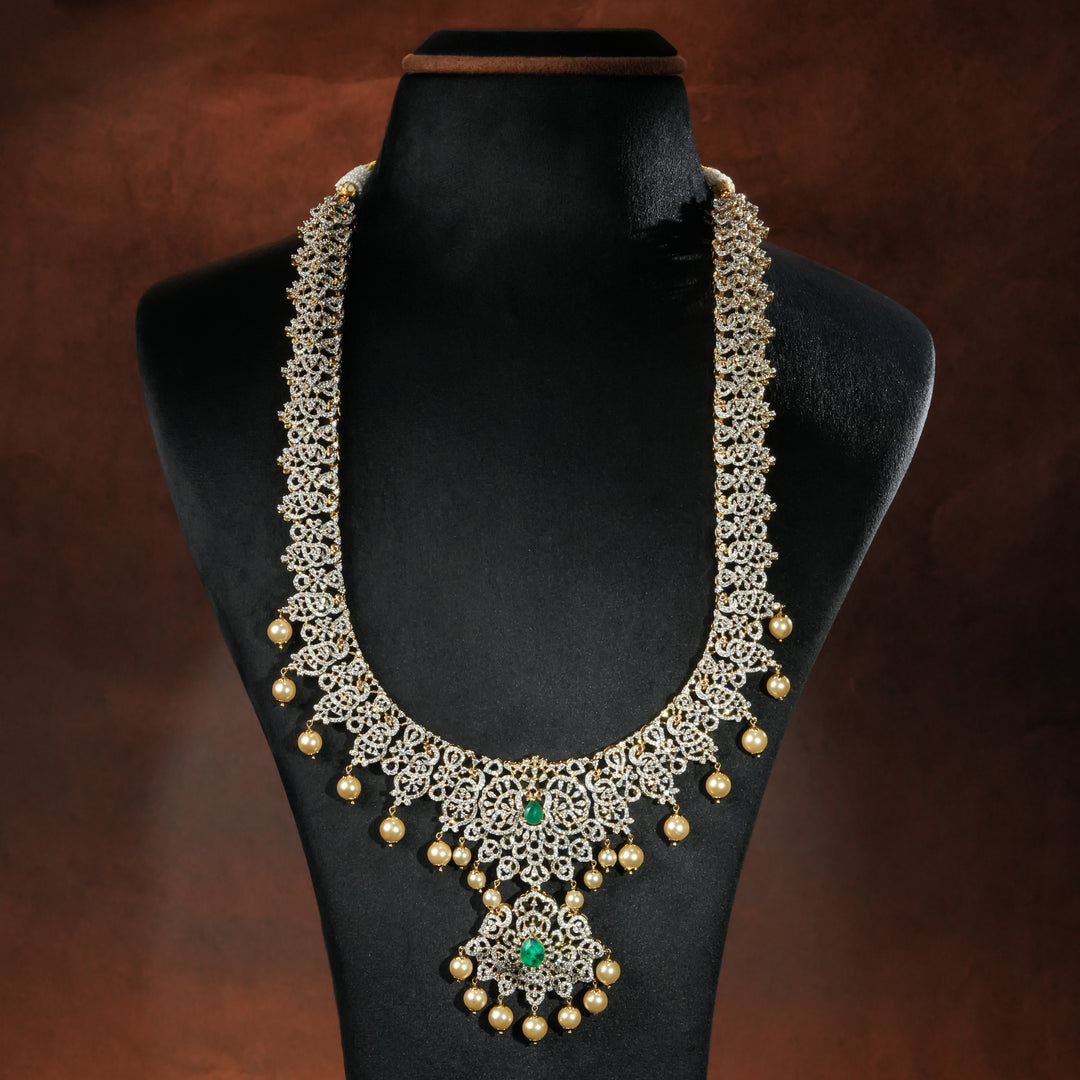 Luxury bridal necklace set in 92.5 silver with emerald green stones, antique finish and intricate victorian floral design, handcrafted wedding jewellery for brides by Sri Fine Jewellery, Hyderabd(https://srifinejewellery.com)