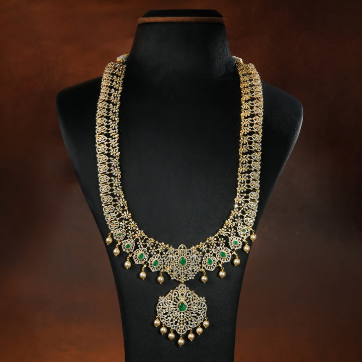 Luxury bridal necklace set in 92.5 silver with emerald green stones, antique finish and intricate victorian floral design, handcrafted wedding jewellery for brides by Sri Fine Jewellery, Hyderabd(https://srifinejewellery.com)