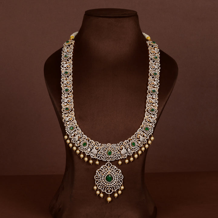 Luxury bridal necklace set in 92.5 silver with emerald green stones, antique finish and intricate victorian floral design, handcrafted wedding jewellery for brides by Sri Fine Jewellery, Hyderabd(https://srifinejewellery.com)
