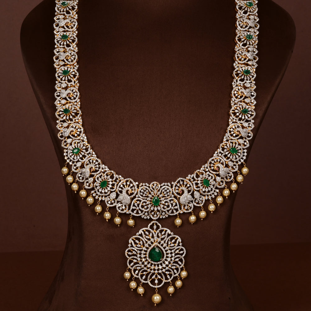 Luxury bridal necklace set in 92.5 silver with emerald green stones, antique finish and intricate victorian floral design, handcrafted wedding jewellery for brides by Sri Fine Jewellery, Hyderabd(https://srifinejewellery.com)