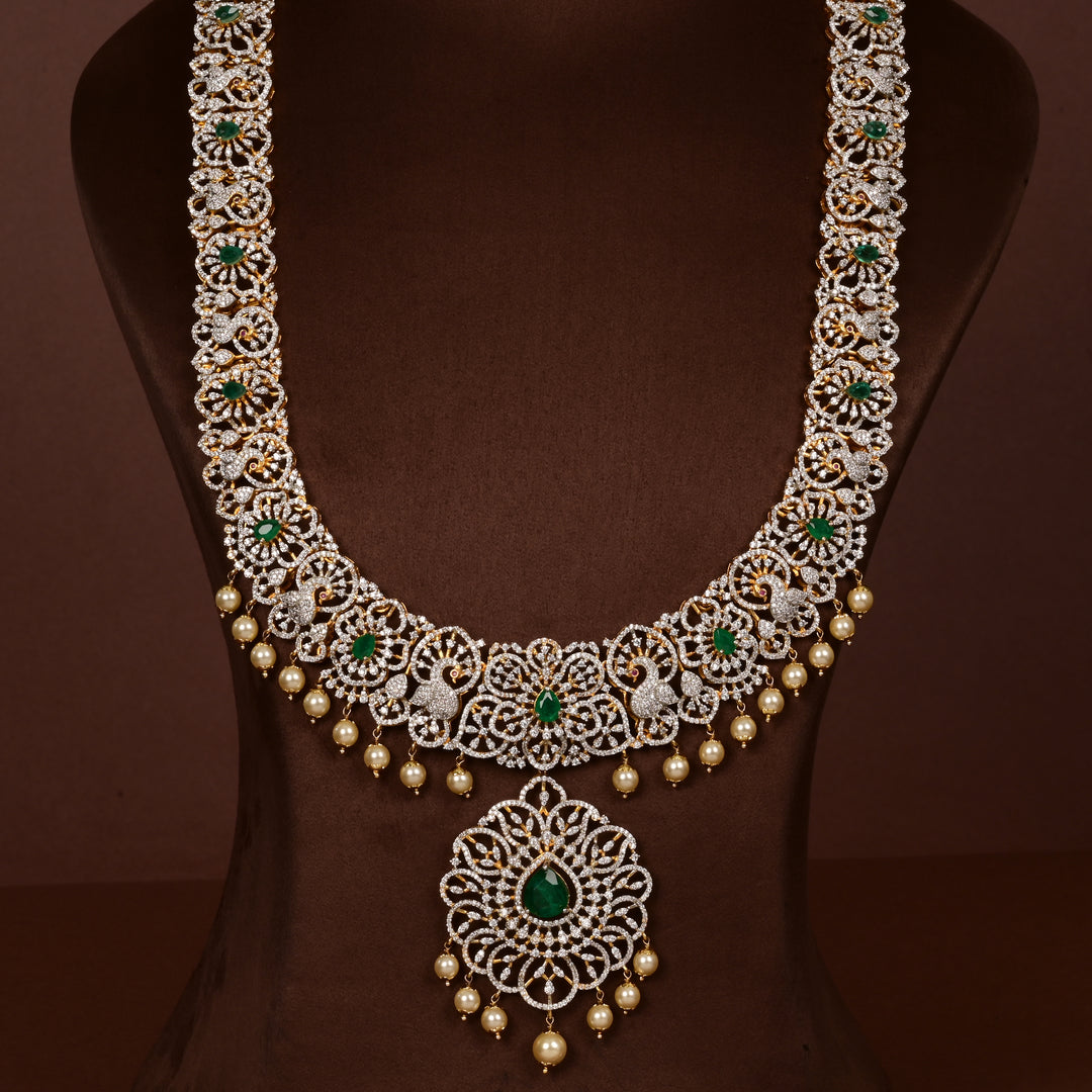 Luxury bridal necklace set in 92.5 silver with emerald green stones, antique finish and intricate victorian floral design, handcrafted wedding jewellery for brides by Sri Fine Jewellery, Hyderabd(https://srifinejewellery.com)