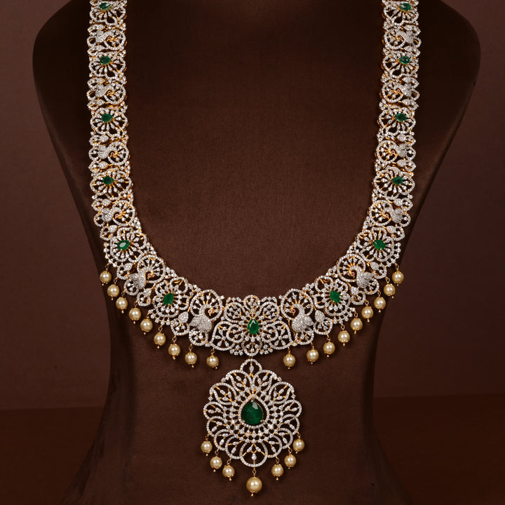 Luxury bridal necklace set in 92.5 silver with emerald green stones, antique finish and intricate victorian floral design, handcrafted wedding jewellery for brides by Sri Fine Jewellery, Hyderabd(https://srifinejewellery.com)
