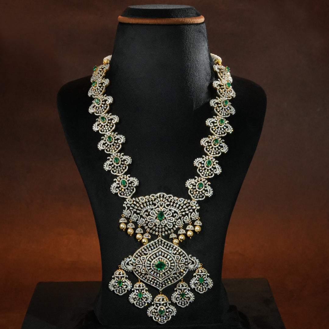 Luxury bridal necklace set in 92.5 silver with emerald green stones, antique finish and intricate victorian floral design, handcrafted wedding jewellery for brides by Sri Fine Jewellery, Hyderabd(https://srifinejewellery.com)