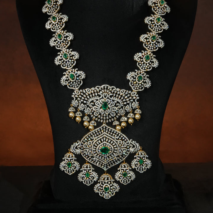 Luxury bridal necklace set in 92.5 silver with emerald green stones, antique finish and intricate victorian floral design, handcrafted wedding jewellery for brides by Sri Fine Jewellery, Hyderabd(https://srifinejewellery.com)