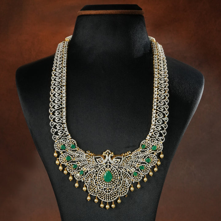 Full view of premium 92.5 silver cz emerald necklace with peacock motifs, intricate detailing and pearl drops by Sri Fine Jewellery, Hyderabd(https://srifinejewellery.com)