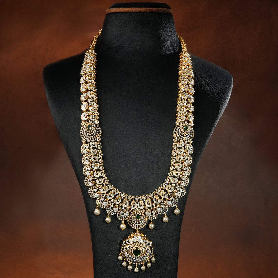 Full view of premium 92.5 silver cz emerald necklace with peacock motifs, intricate detailing and pearl drops by Sri Fine Jewellery, Hyderabd(https://srifinejewellery.com)